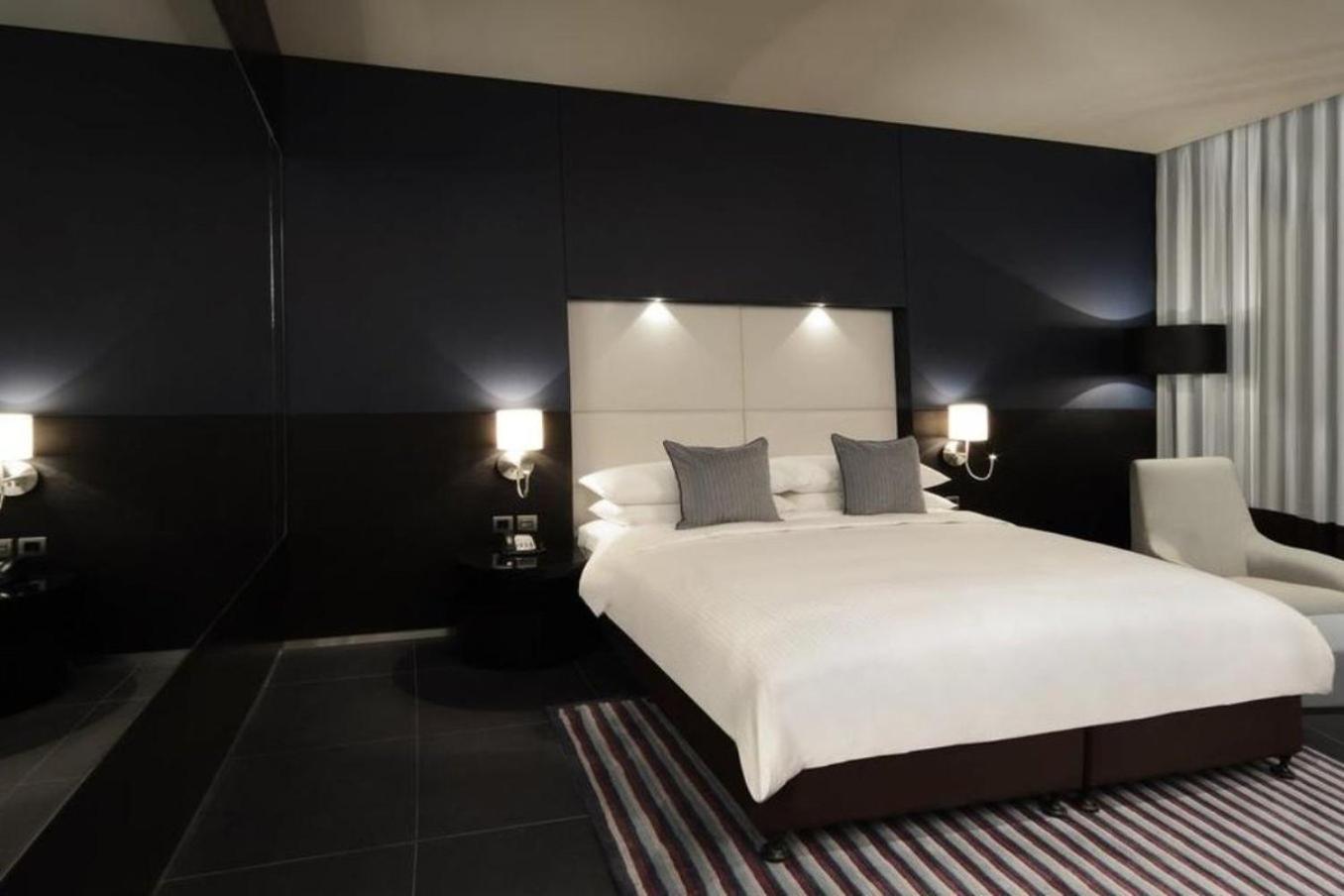 The Abdali Boulevard Hotel Αμμάν Εξωτερικό φωτογραφία A bedroom at the Mandarin Oriental, Munich