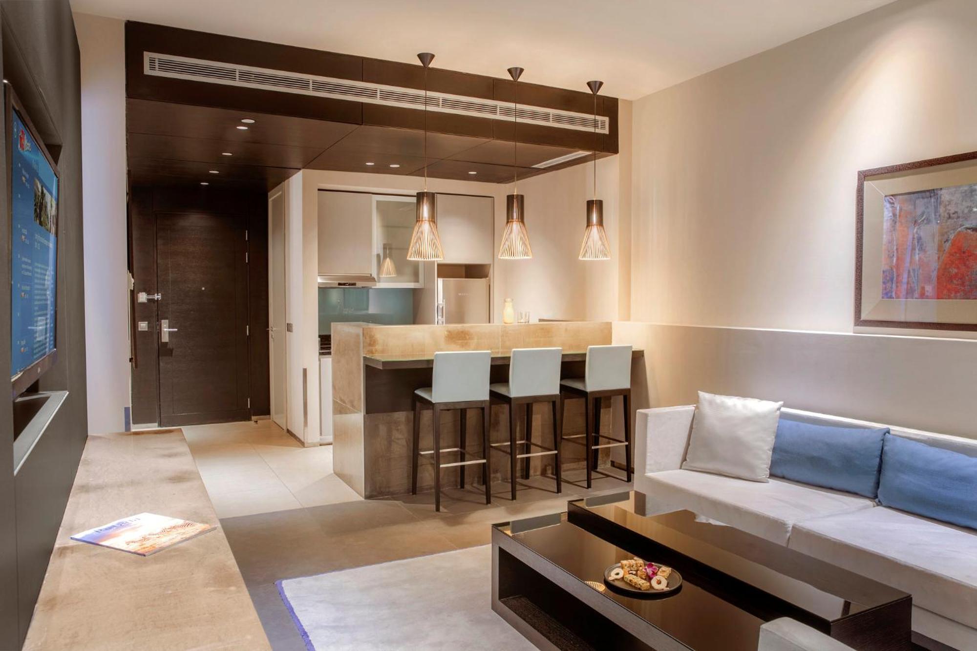 The Abdali Boulevard Hotel Αμμάν Εξωτερικό φωτογραφία A living room with a kitchenette