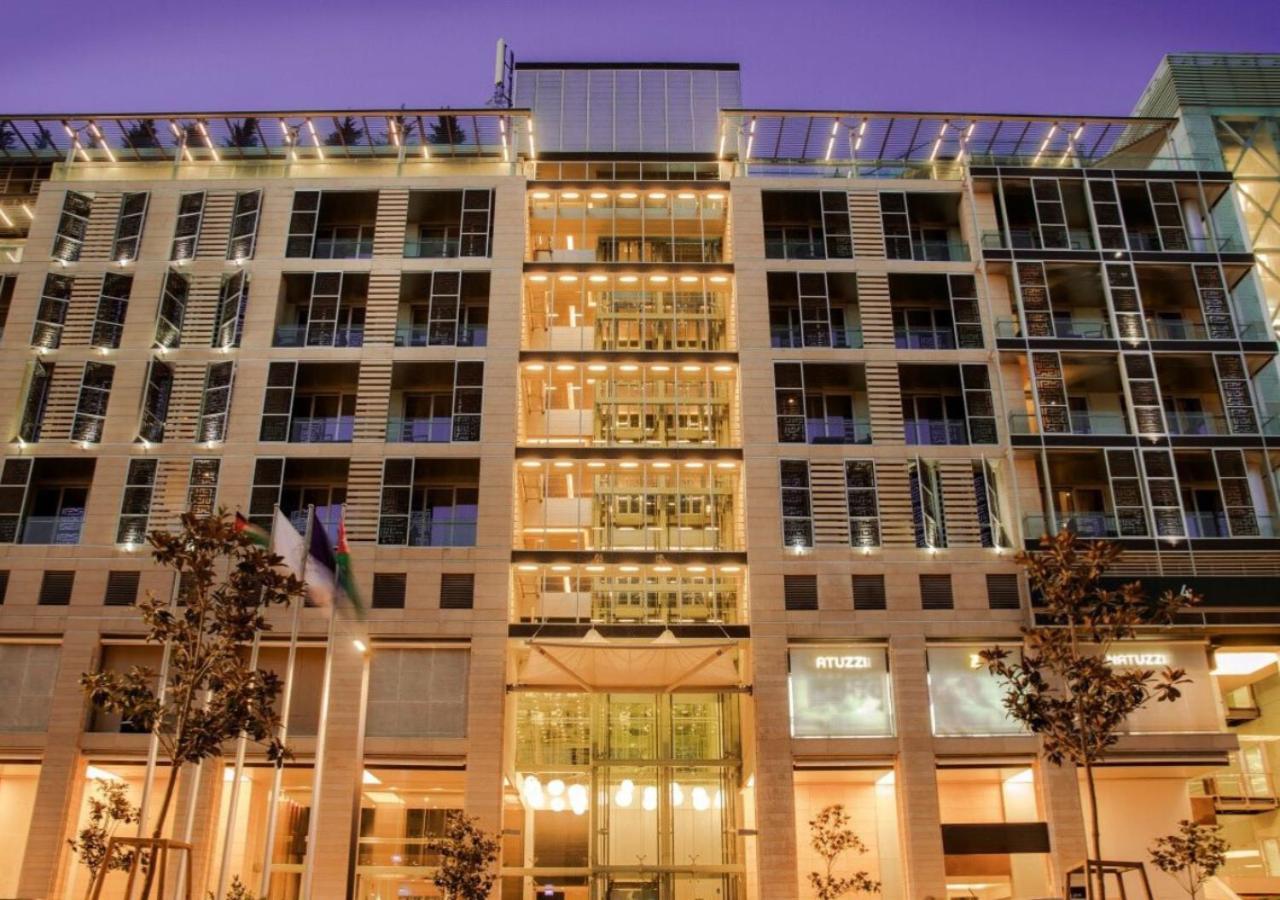 The Abdali Boulevard Hotel Αμμάν Εξωτερικό φωτογραφία The hotel at night